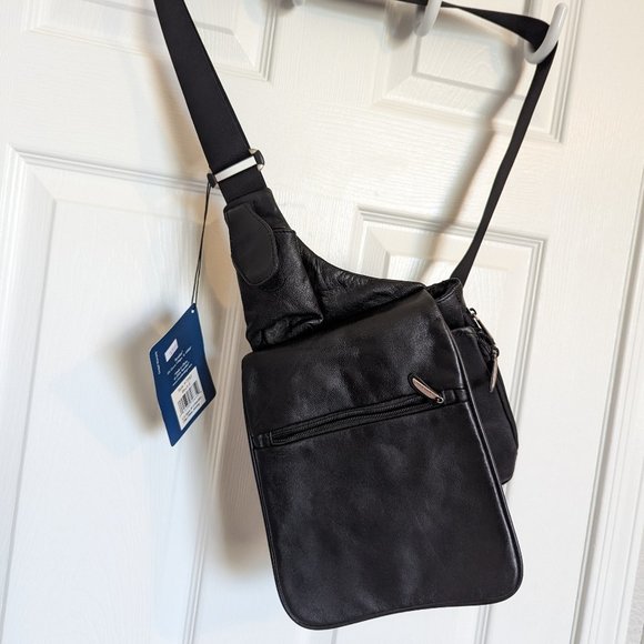 Travelon Handbags - NWT CROSSBODY TRAVEL / ORGANIZER ANTI-THEFT BAG | Travelon | Black |